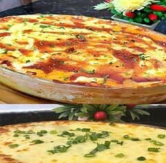 Mandioca recheada no forno com queijo e presunto